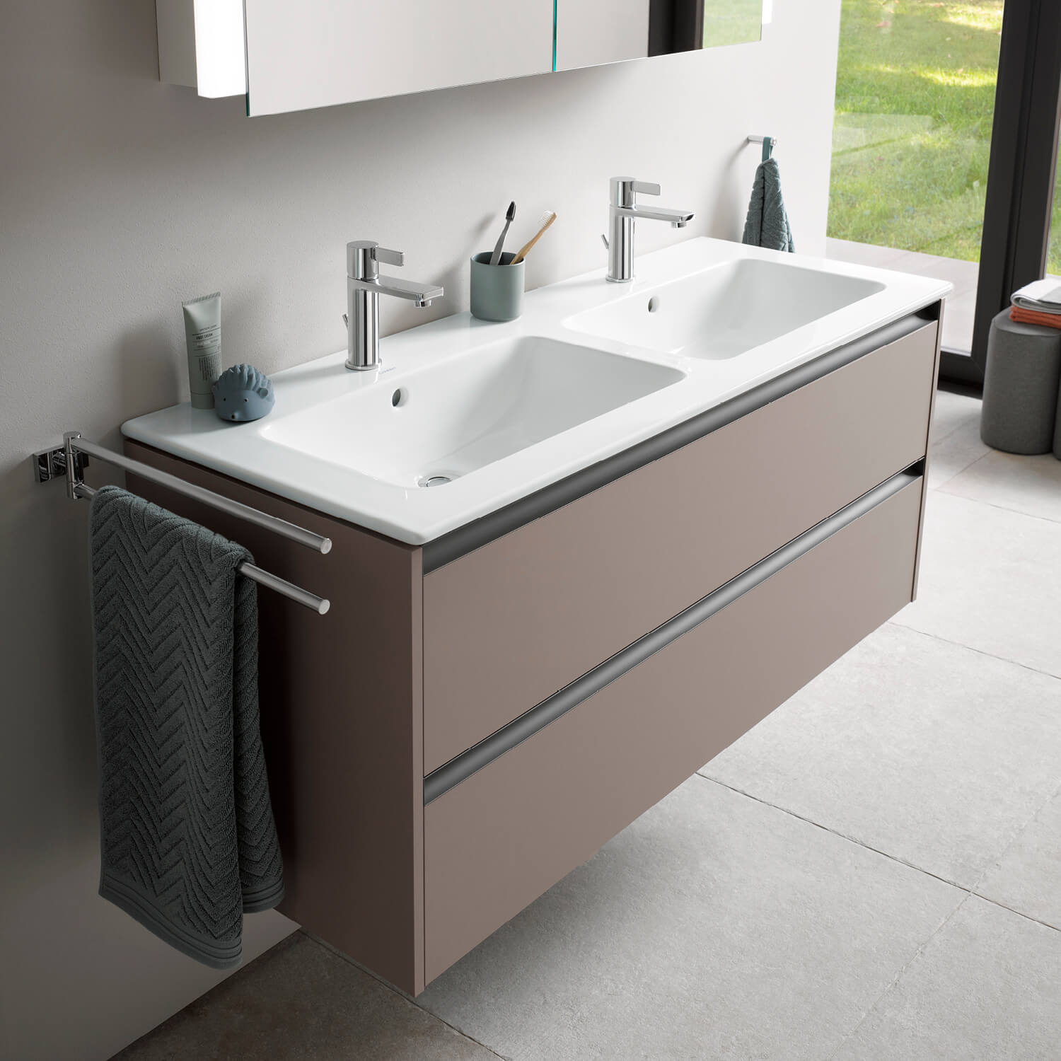 Square Ketho.2 washbasin cabinet infront of a mirrow
