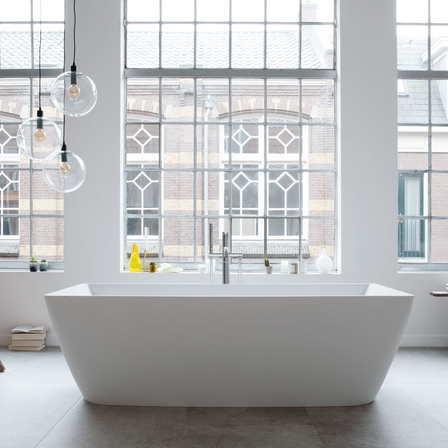 DuraSquare bathtub freestanding in front of window frontage
