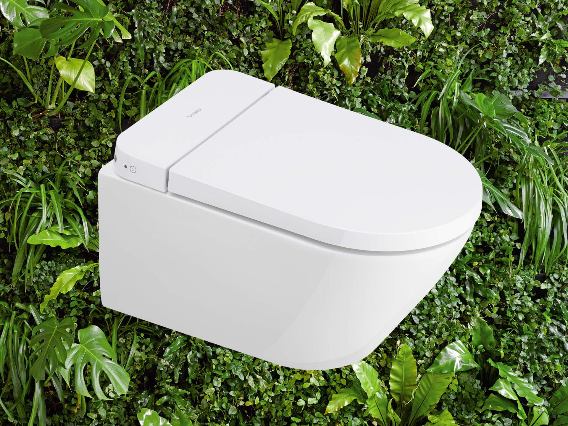 SensoWash® D-Neo shower toilet with green background
